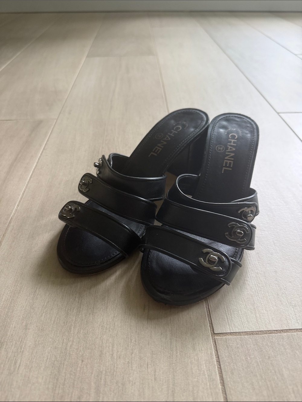 CHANEL Black Leather Triple-Strap Camellia Logo Mules